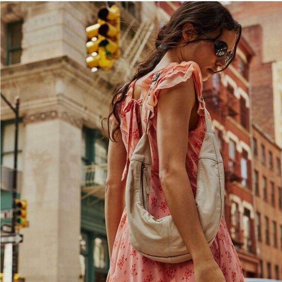Free People Handbags - NWT Gorgeous RARE Free People GOAT Leather Idle Hands cream Sling Hobo Bag